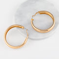 Chunky Hollow Hoop Earrings | Earrings by DORADO