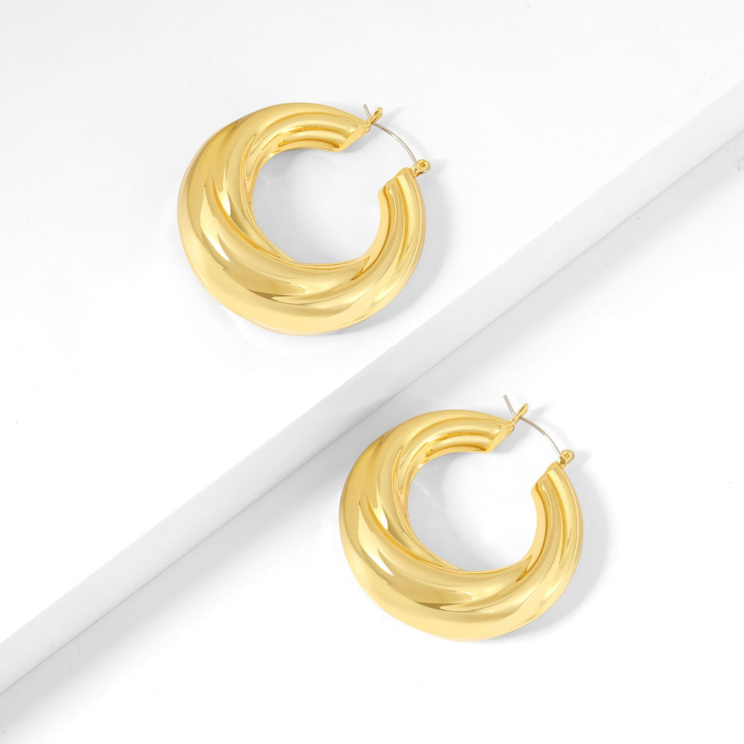 Round Twisted Hoop Earrings | Earrings by DORADO