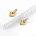 Heart Huggie Hoop Earrings | Earrings by DORADO