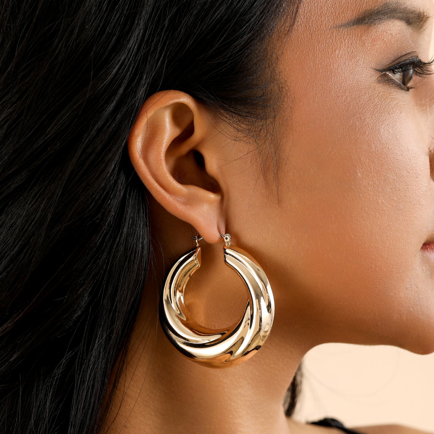 Round Twisted Hoop Earrings | Earrings by DORADO
