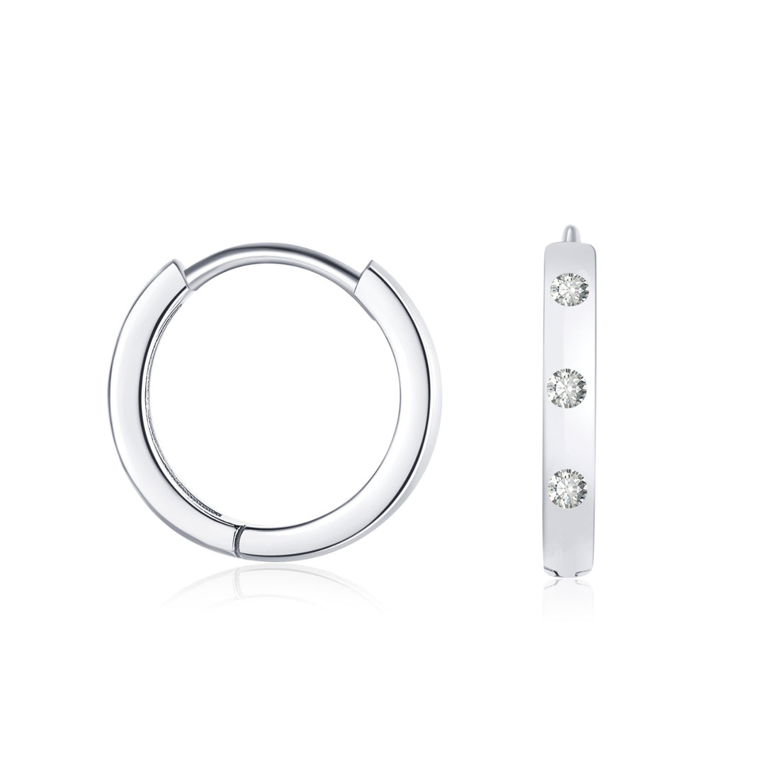 Flush Set Moissanite Huggie Earrings | Earrings by DORADO