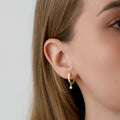 Moissanite Drop Huggie Earrings | Earrings by DORADO