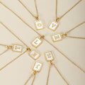 Pearl Initial Tag Necklace | Necklaces by DORADO